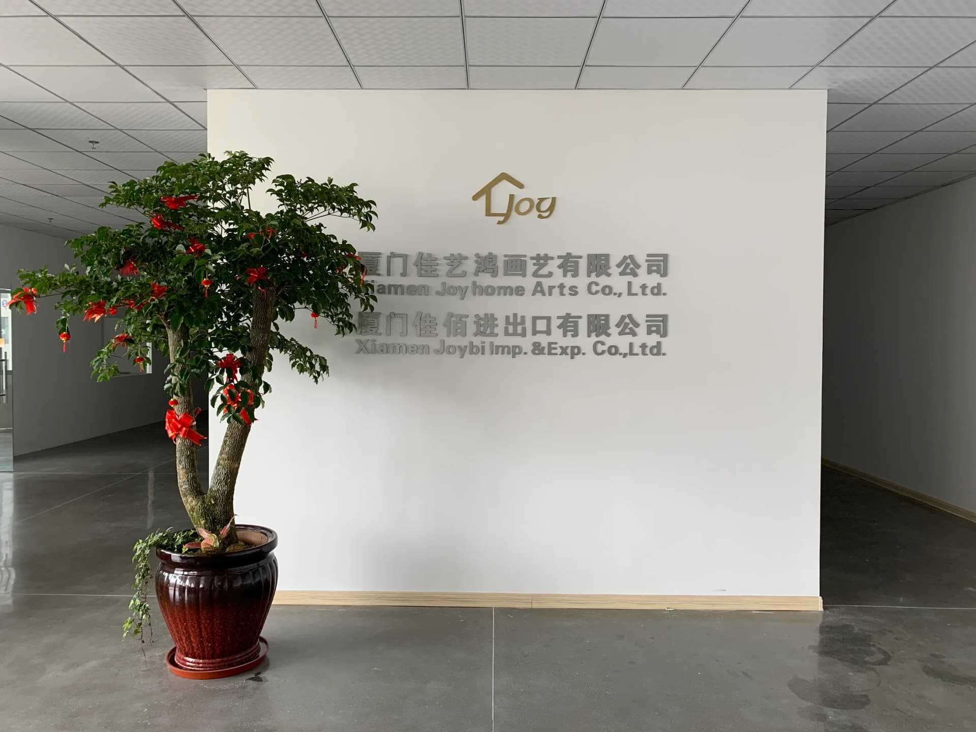 Joyhome-Arts-Namenswand im Büro in Xiamen